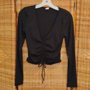 Like New Cond, Black top, no snags, Cinch front. Long sleeves. Women XS